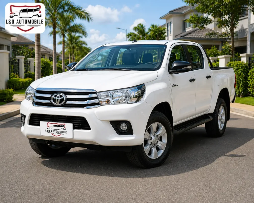 Toyota Hilux Revo rental yaounde white rear view - pickup truck rental Yaoundé L & D Automobile
