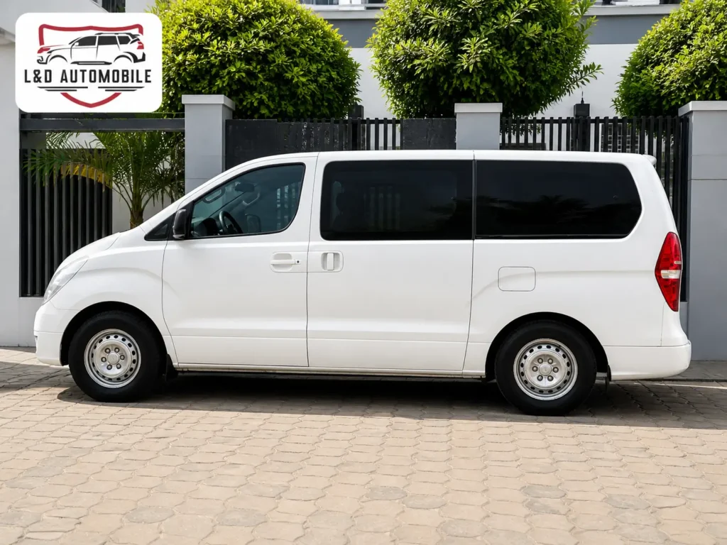 Hyundai H1 Starex white side profile - 9 seat van hire Yaoundé